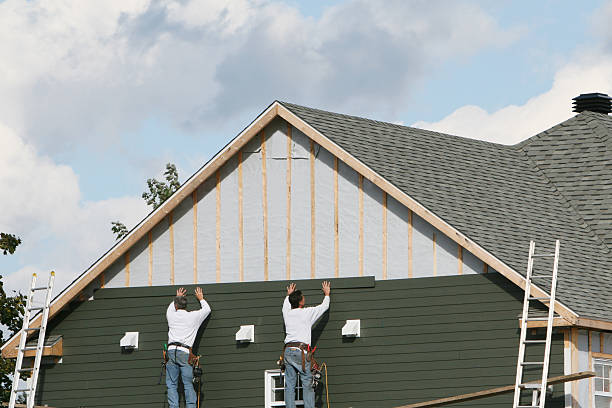 Professional Siding Replacement technician working in Glenmoore, PA